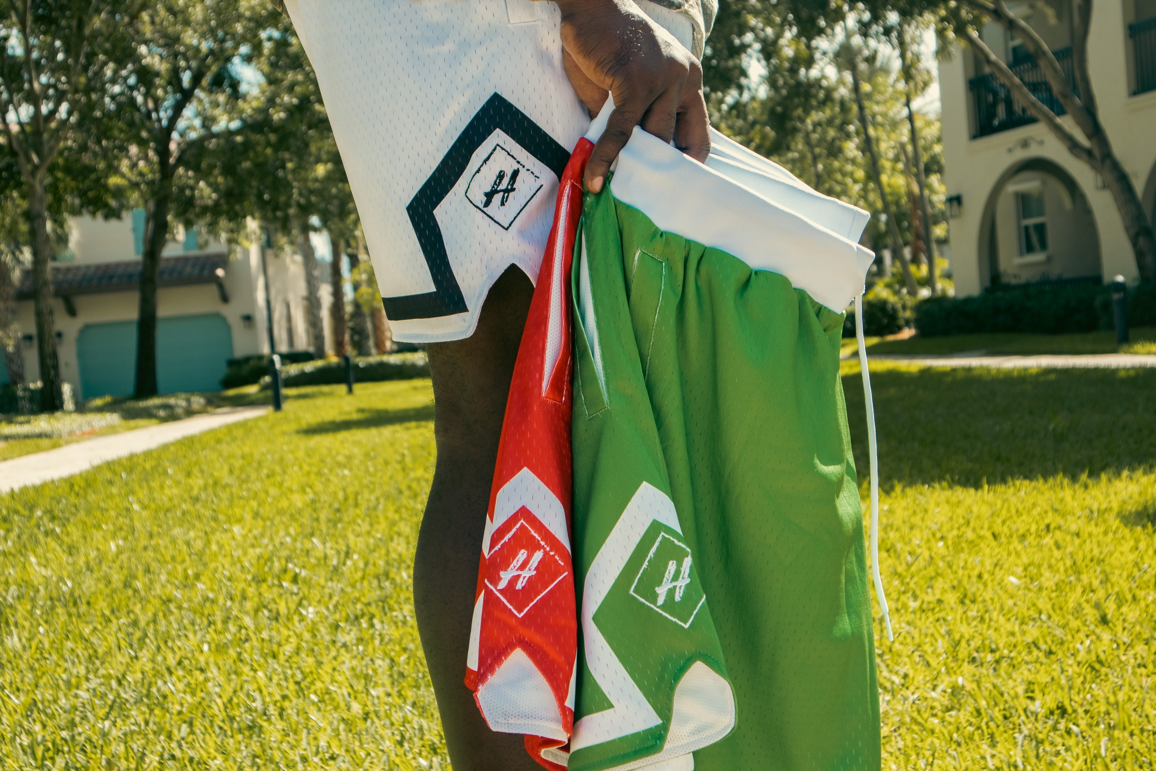 Welt hand pockets  Graphics screened on both legs  Neatly stitched and printed design  Inside drawstring  Light mesh shorts