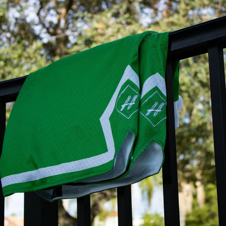 Money Green Board Member Shorts is now available at our store with an inside draw string and light mesh. It features a snow-white line surrounding the bottom of the shorts with our signature H logo stitched on encapsulated by a neat pure white diamond. 